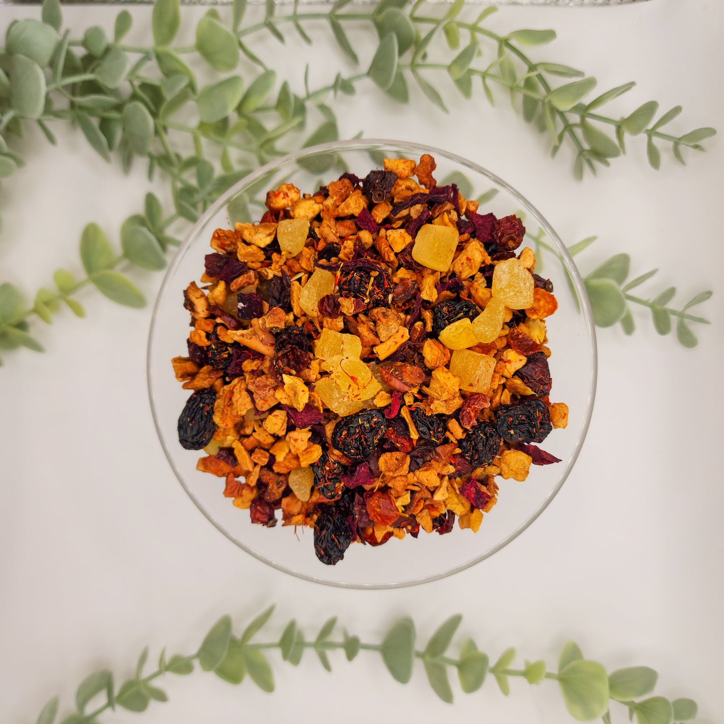 Tisane Cerise en Fête - mélange fruité avec morceaux de cerise pomme raisin ananas et fleurs de carthame